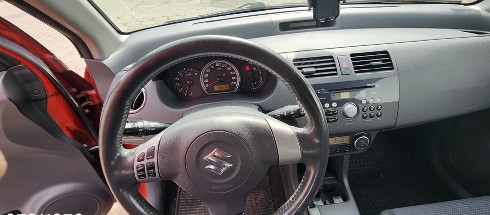 Suzuki Swift cena 12900 przebieg: 156230, rok produkcji 2009 z Warszawa małe 67